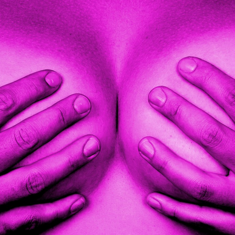 bigstock-Hands-Covering-Breasts-64704169
